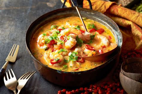  Moqueca! Ein Schmelztiegel von Meeresfrüchten in Kokosmilch und den Aromen Brasiliens